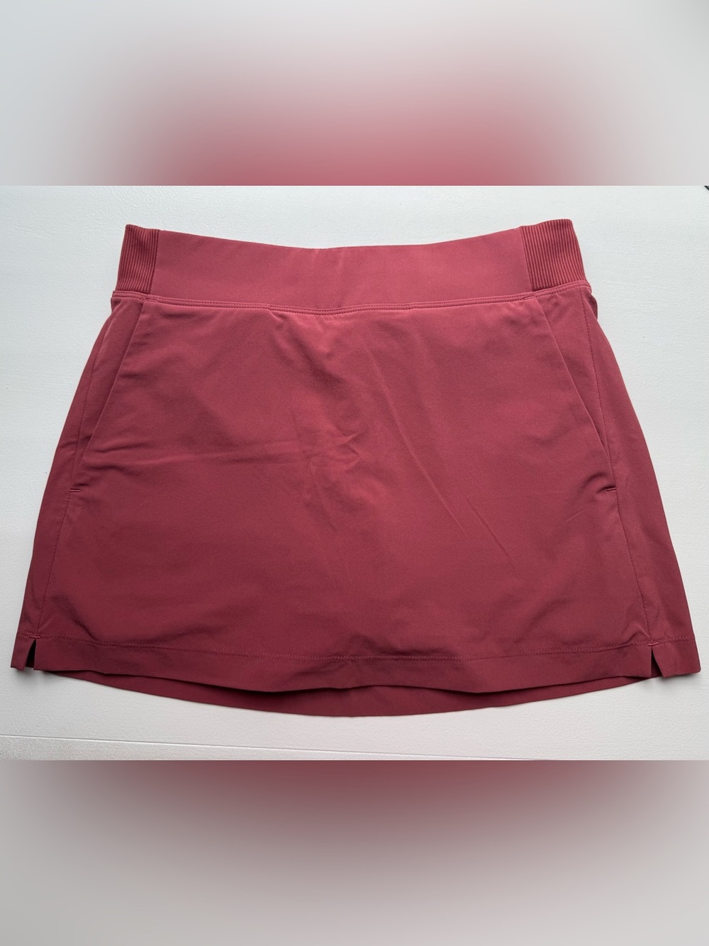 Athleta Brooklyn mid rise skort in red rock color